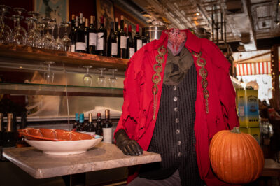 The headless horseman sits at a table at Mint restaurant.