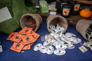 Headless horseman buttons and coasters displayed for sale at the annual Sleepy Hollow Street Fair.