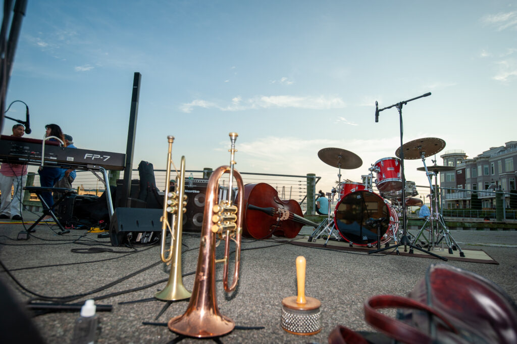 Jazz instruments reflect sunset at Horan's Landing park in Sleepy Hollow, New York.