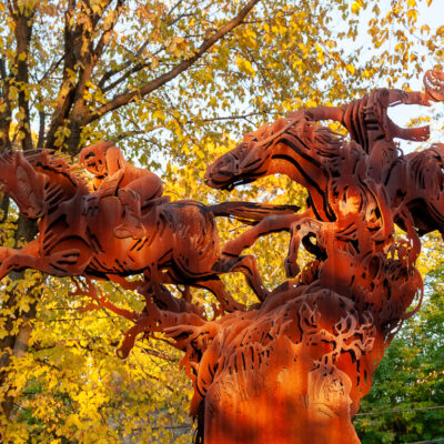 The steel sculpture of the headless horseman and Ichabod Crane stands alongside Route 9 in Sleepy Hollow, NY.