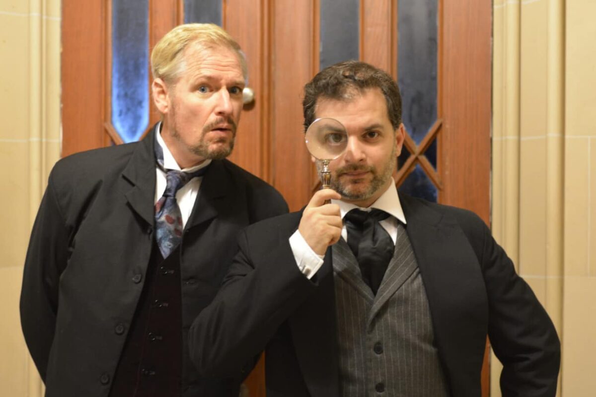 Actors pose as Sherlock Holmes and Dr. Watson at the Lyndhurst mansion in Tarrytown.