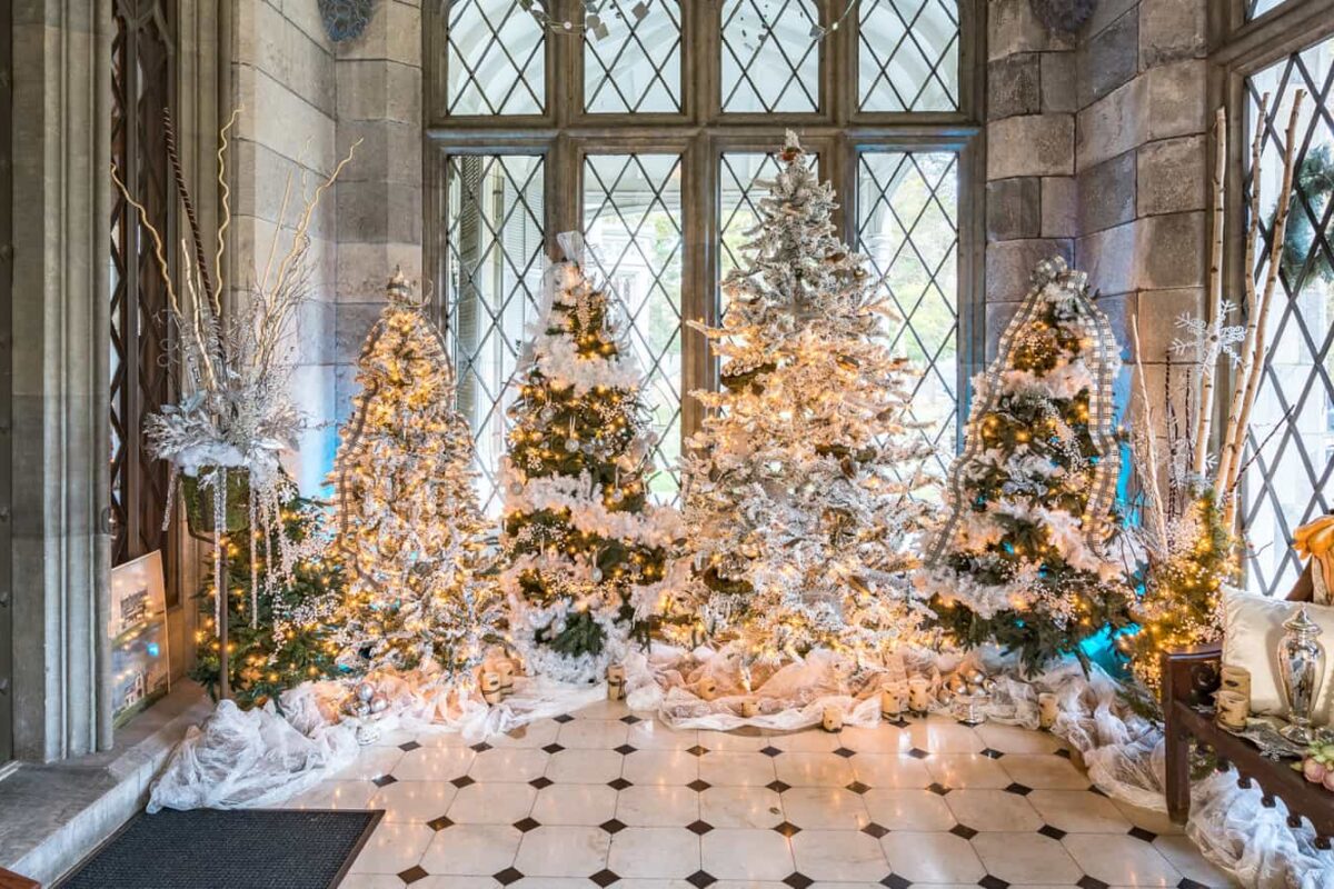 The entry to Lyndhurst mansion is decorated for Christmas with trees ,ribbons and bows.