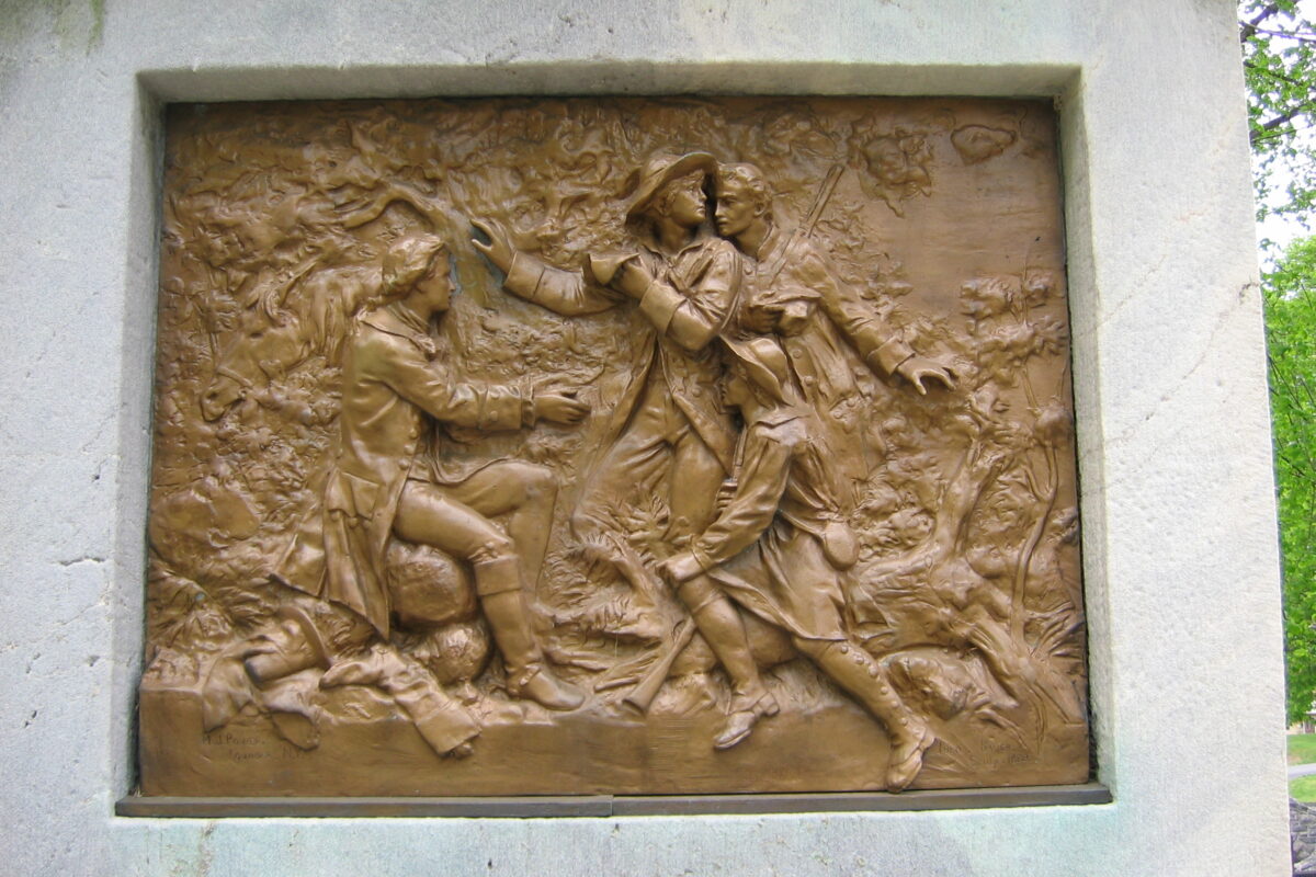 This bronze tablet depicts the capture at Tarrytown of British spy John Andre during the American Revolution.